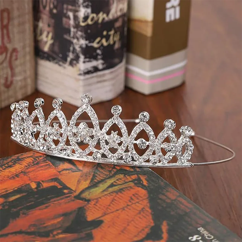 Hvad gør Crystal Crown Metal pandebånd til en tidløs erklæring om elegance og håndværk?